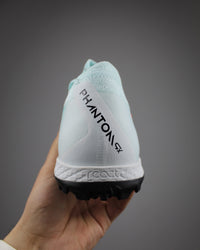 Phantom GX II Pro TF turf soccer shoe in a mint green Turf Football Boots
