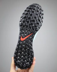 Phantom GX II Pro TF turf soccer shoe in a mint green Turf Football Boots