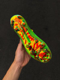 Phantom 6 Low Elite FG cleats, featuring a striking neon green Football Boots