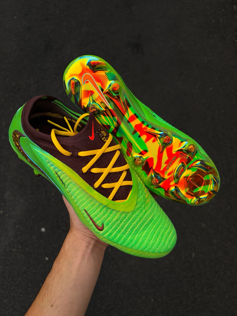Phantom 6 Low Elite FG cleats, featuring a striking neon green Football Boots
