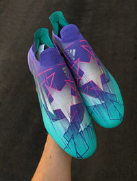 X Speedflow+ FG "Champions Code" football boot