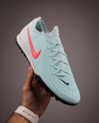 Phantom GX II Pro TF turf soccer shoe in a mint green Turf Football Boots