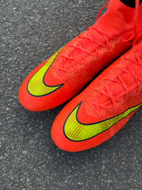 Mercurial Superfly IV FG soccer cleat in the "Hyper Punch/Gold/Black" colorway from the 2014 World Cup Pack football Boots