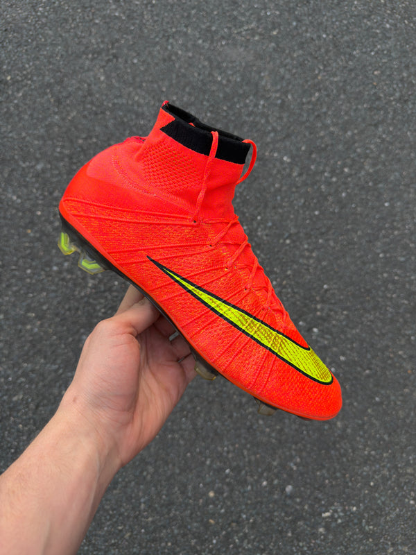 Mercurial Superfly IV FG soccer cleat in the "Hyper Punch/Gold/Black" colorway from the 2014 World Cup Pack football Boots